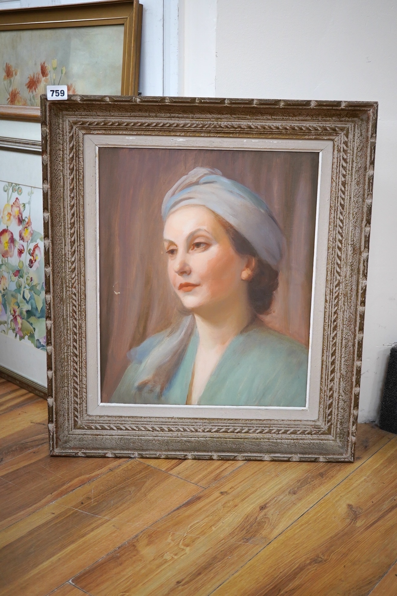 20th century School, oil on canvas, Portrait of a lady wearing a turban, unsigned, 45 x 36cm. Condition - fair, scuff to centre left